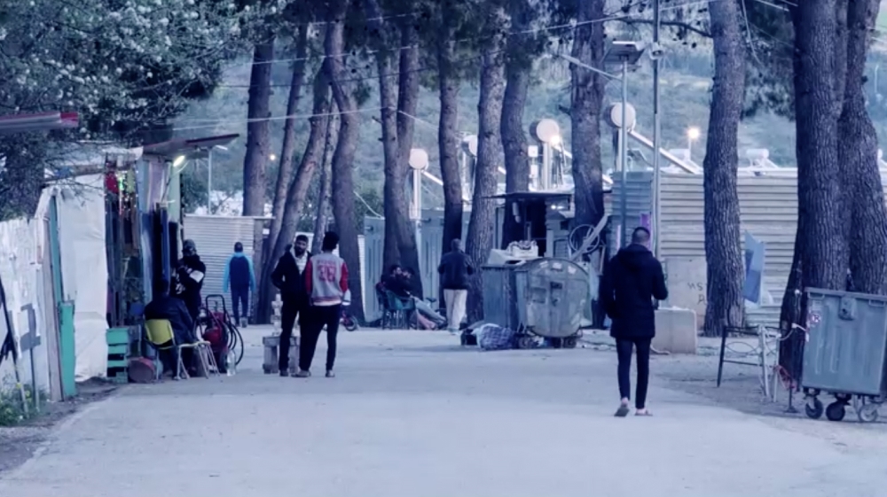 GATES OF RITSONA MIGRANT CAMP