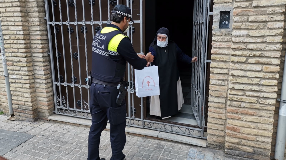 Spain Catholics make masks as they forgo famed Easter processions