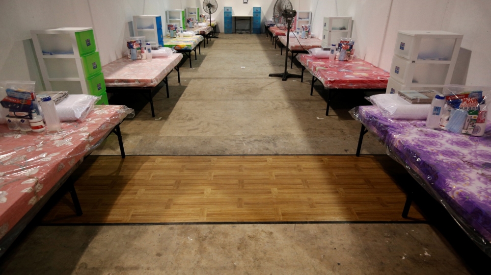 A view of beds at Changi Exhibition Centre which has been repurposed into a community isolation facility that will house recovering or early COVID-19 patients with mild symptoms