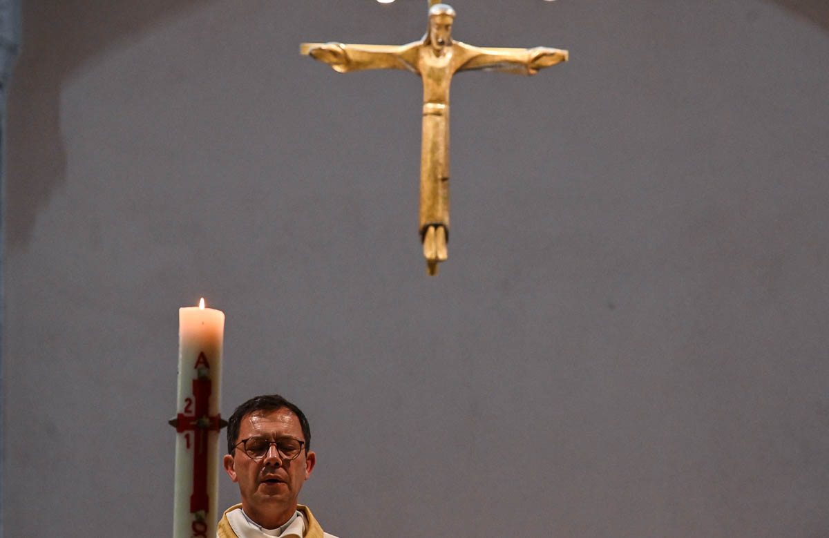 French bishops Emmanuel Gobillard celebrates the Eucharist during the Easter''s Holy Saturday Vigil on April 11, 2020, in Lyon, southeastern France, during the lockdown aimed at curbing the spread of t