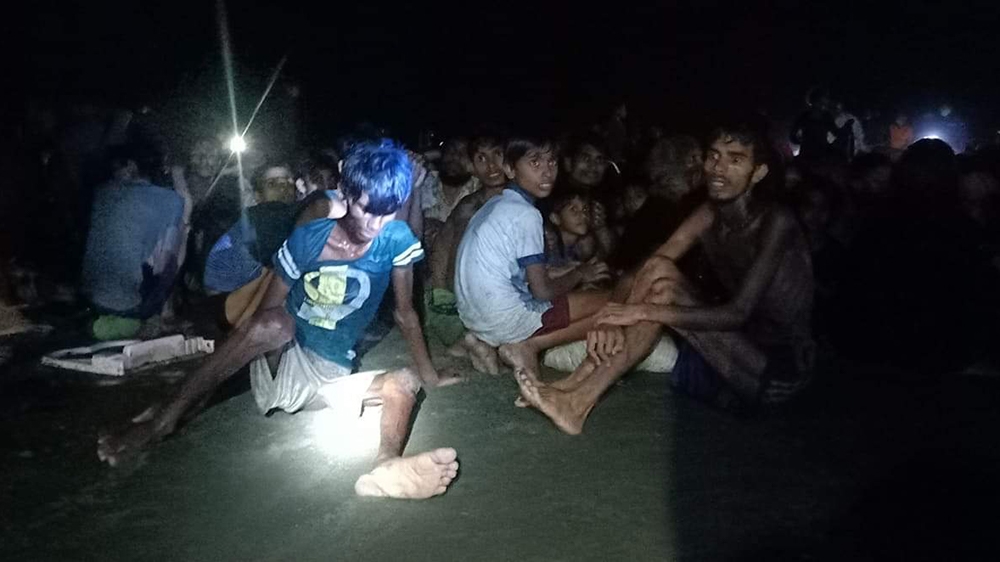 rescued refugees in Cox's Bazaar [Abdul Aziz/Al Jazeera]