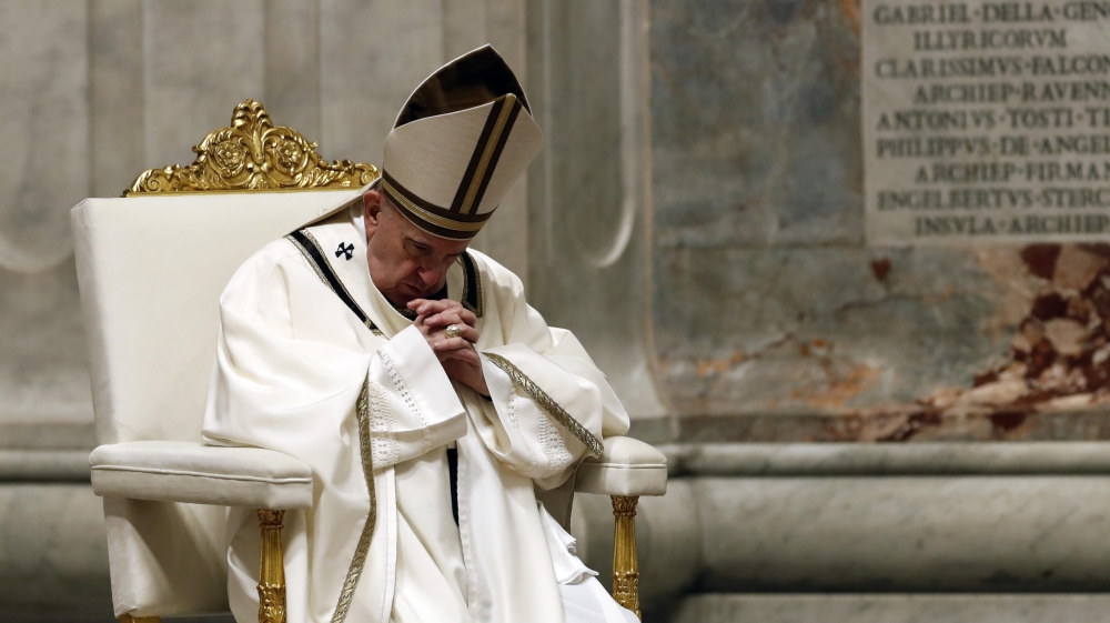 epa08357968 Pope Francis leads the Easter Vigil Mass in St. Peter's Basilica, behind closed door due to the outbreak of the coronavirus disease (COVID-19) at the Vatican, 11 April 2020. EPA-EFE/REMO 