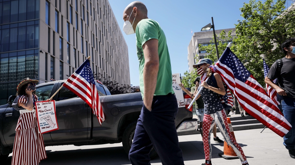 Protestors Rally At Los Angeles City Hall Against Shelter-At-Home Order