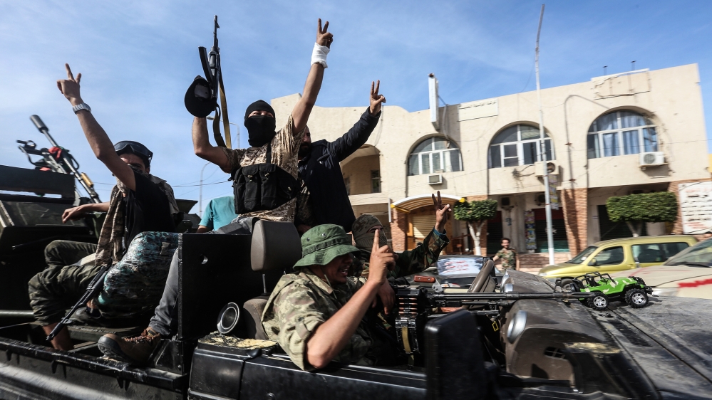 Libya''s GNA seize Sabratha and Surman- - SABRATHA, LIBYA - APRIL 13: Libya''s Government of National Accord forces celebrate after taking control of Sabratha and its Surman town from warlord Khalifa Ha