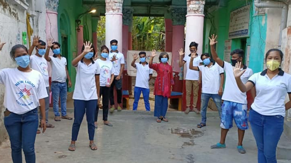  NGO New Light Kolkata distributes ration and food to 500 families in Kolkata. [Courtesy of New Light Kolkata]