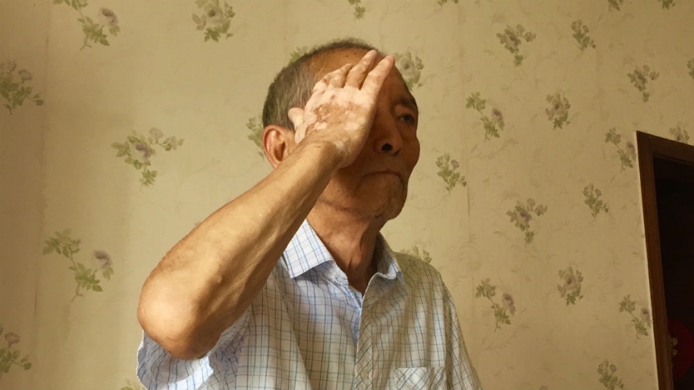 Photo of Zhang Lifa saluting during 70 year parade last year. Supplied by Zhang Hai