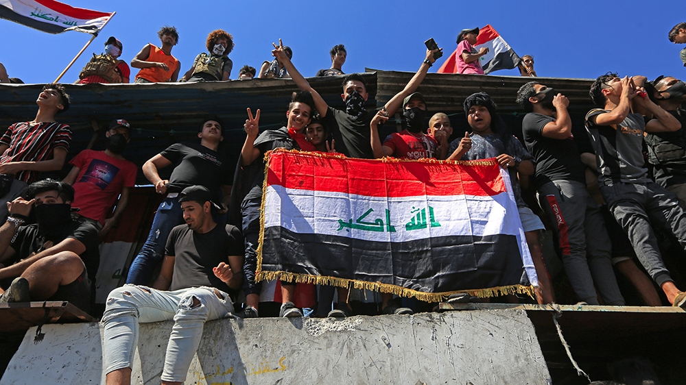 BAGHDAD, IRAQ - MAY 10: Iraqi demonstrators gather to stage a protest as the protests have started again after a break due to coronavirus (Covid-19) measures, in Baghdad, Iraq on May 10, 2020. ( Mur