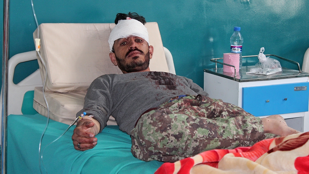 A wounded Afghan National Army (ANA) soldier rests inside a hospital after an attack on Afghan army base in Gardez, capital of Paktia province on May 14, 2020. - The Taliban said it carried out a dead