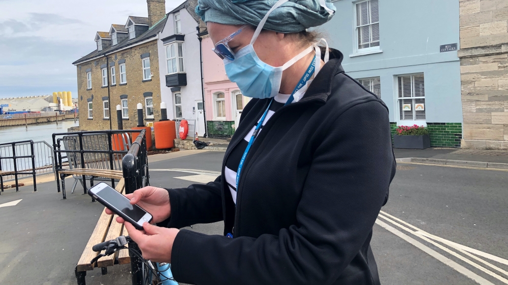 COvid app UK Reuters