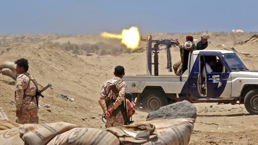 Fighters from of the Southern Transitional Council (STC) fire towards the positions of Saudi-backed government forces during clashes in the Sheikh Salim area in the southern Abyan province on May 11, 