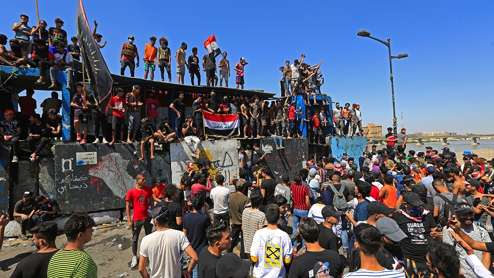 BAGHDAD, IRAQ - MAY 10: Iraqi demonstrators gather to stage a protest as the protests have started again after a break due to coronavirus (Covid-19) measures, in Baghdad, Iraq on May 10, 2020. ( Mur