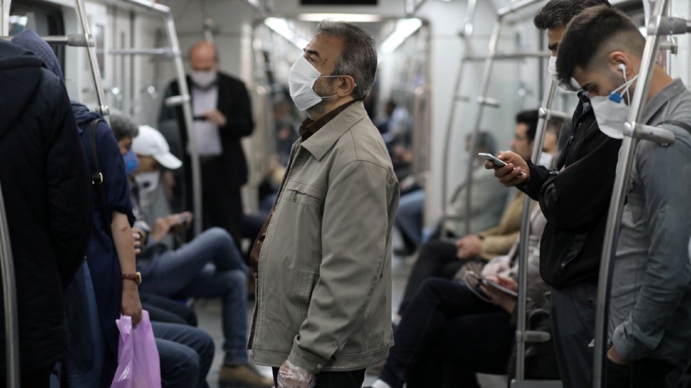 Iranians wear protective face masks, following the outbreak of the coronavirus disease (COVID-19), as they drive with the metro, in Tehran, Iran, May 20, 2020. WANA (West Asia News Agency