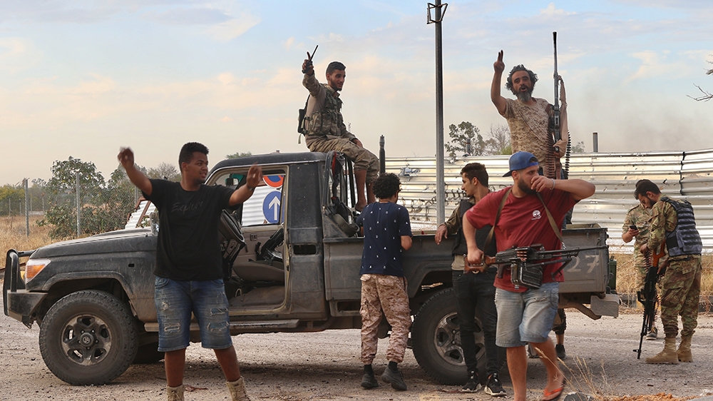 TRIPOLI, LIBYA - JUNE 03: Members of Libyan army celebrate after recapturing Tripoli airport from warlord Khalifa Haftar's militias in Tripoli, Libya on June 03, 2020. ( Hazem Turkia - Anadolu Agency