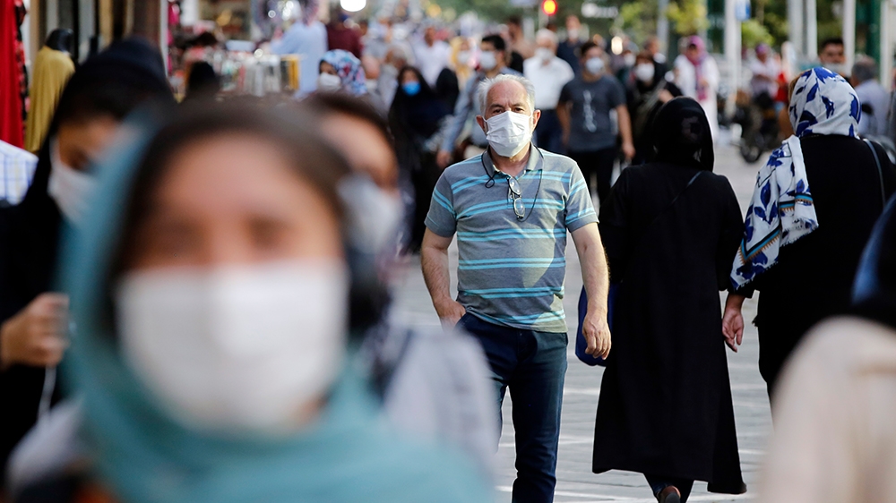 The alarming surge in daily fatalities has sent shockwaves across Iran as the healthcare system is already overwhelmed [EPA]