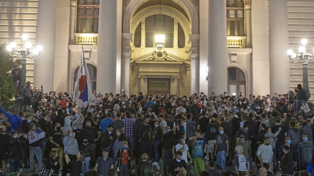 Protesters gather in front of the Serbian parliament in Belgrade,