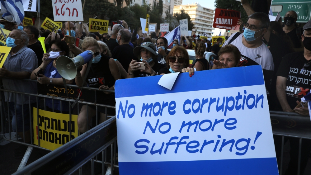 ISRAEL-POLITICS-PROTEST Israelis protest against Israeli Prime Minister Benjamin Netanyahu outside his official residence in Jerusalem, on July 14, 2020.