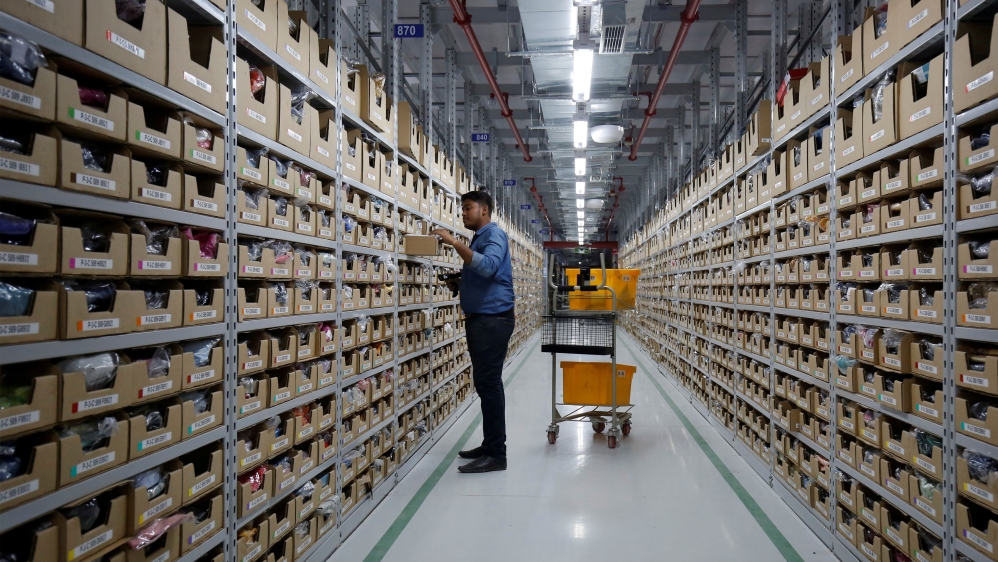 An employee at an Amazon fulfilment centre on the outskirts of Bengaluru, India, in September 2018