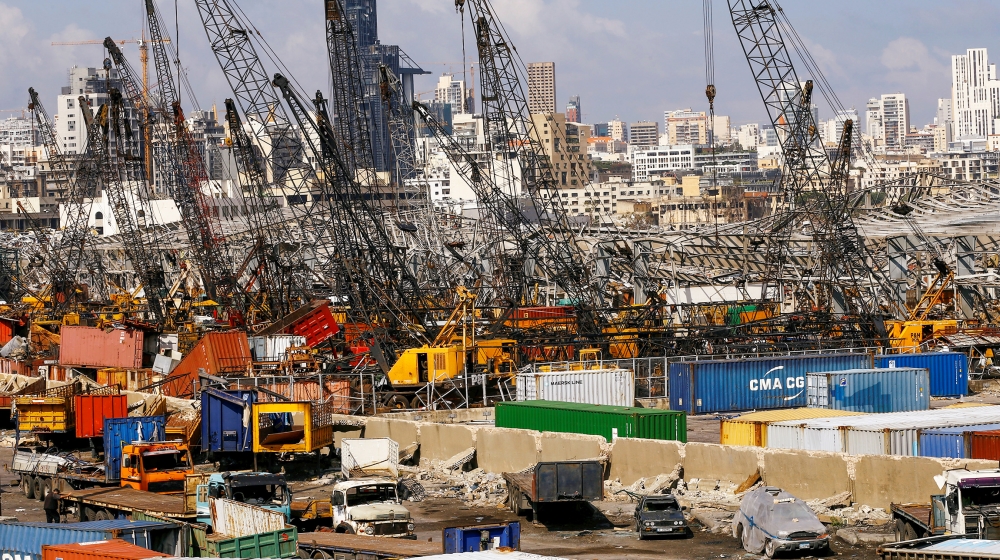 Debris and damaged vehicles are seen in the port area, after a blast in Beirut, Lebanon August 11, 2020. REUTERS/Thaier Al-Sudani