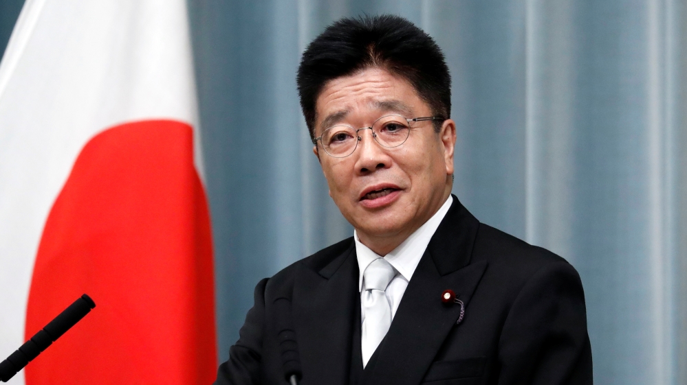 Japan's Health, Labour and Welfare Minister Kato attends a news conference at PM Abe's official residence in Tokyo