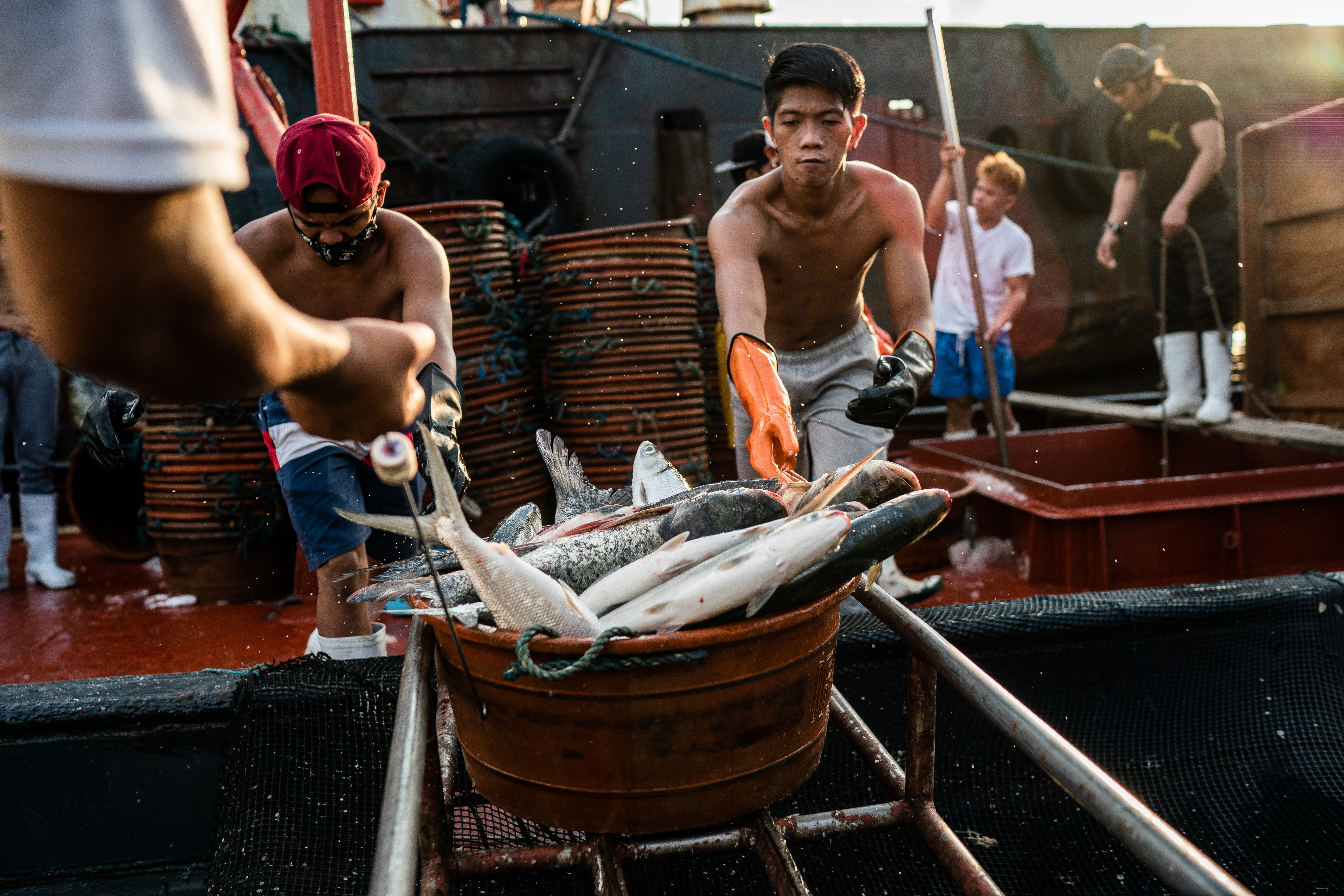 Deep-sea fishing is dangerous work at the best of times, but COVID-19 has made it even more risky [Martin San Diego/Al Jazeera]