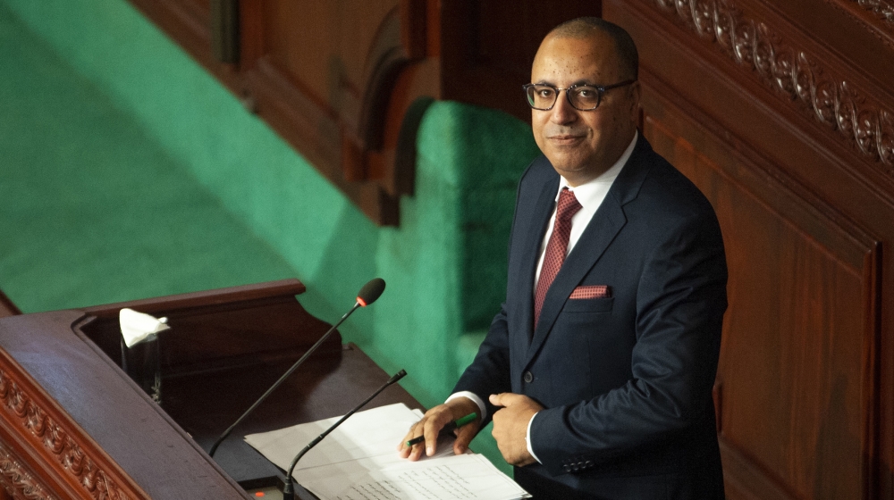 Tunisian designated Prime Minister Hichem Mechichi delivers his speech at the parliament before a confidence vote in Tunis, Tuesday, Sept. 1, 2020. (AP Photo/Riadh Dridi)