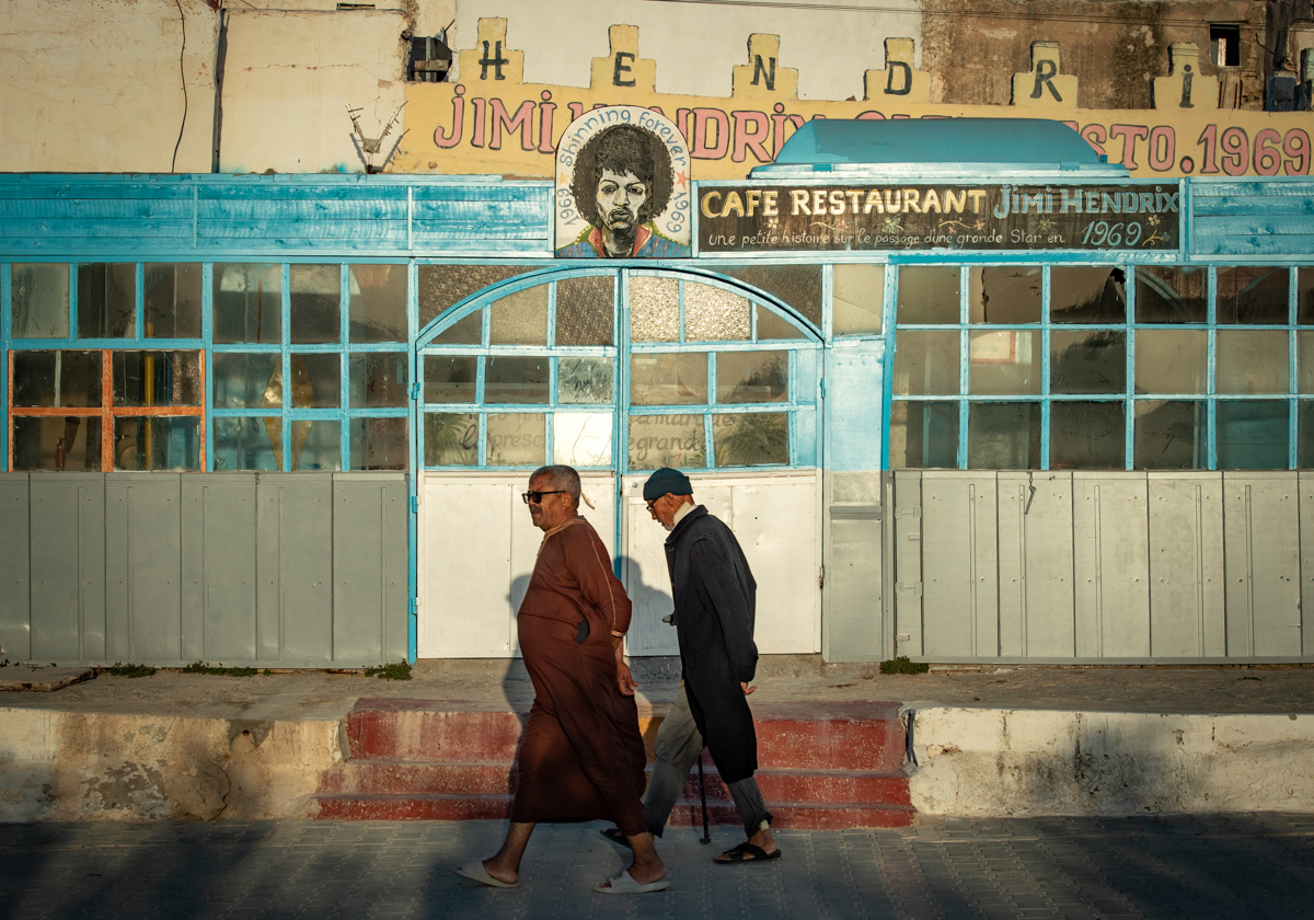 A picture taken in the Moroccan coastal city of Essaouira shows portraits of late US guitarist Jimi Hendrix on September 10, 2020. - Some claim to have seen him, others to have spoken with him -- 50 y