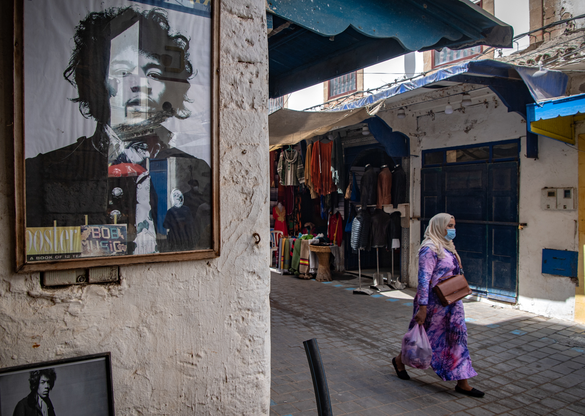 A picture taken in the Moroccan coastal city of Essaouira shows portraits of late US guitarist Jimi Hendrix on September 10, 2020. - Some claim to have seen him, others to have spoken with him -- 50 y