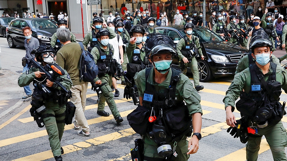 Riot police disperse pro-democracy protesters during a demonstration opposing postponed elections, in Hong Kong, China September 6, 2020. REUTERS/Tyrone Siu