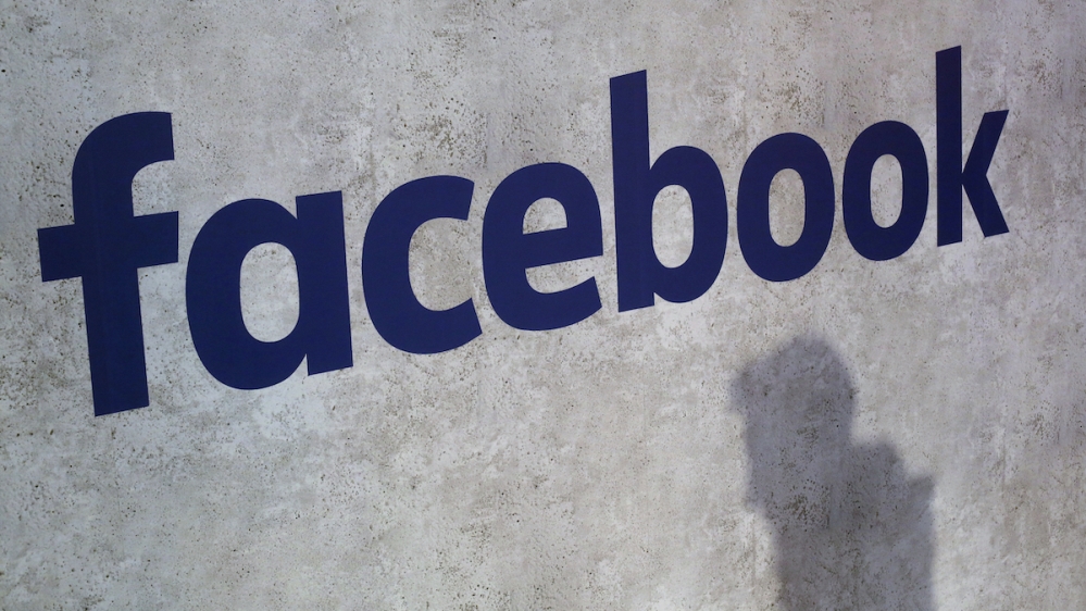 Facebook logo AP Photo