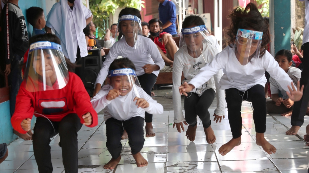 APTOPIX VIRUS OUTBREAK INDONESIA INDEPENDENCE