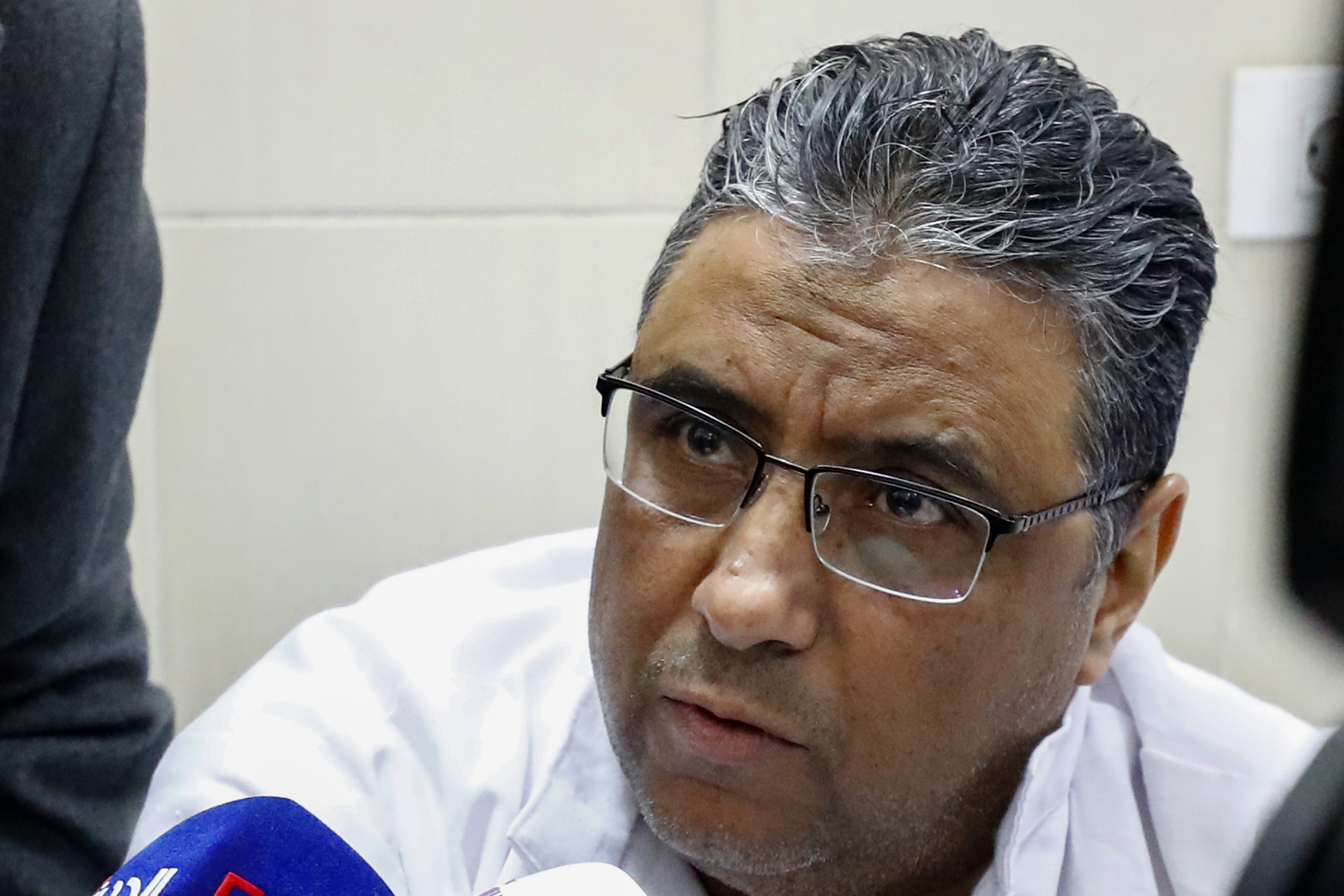 Al Jazeera journalist Mahmoud Hussein will have spent four years behind bars in Egypt this month [File: Khaled Desouki/AFP]