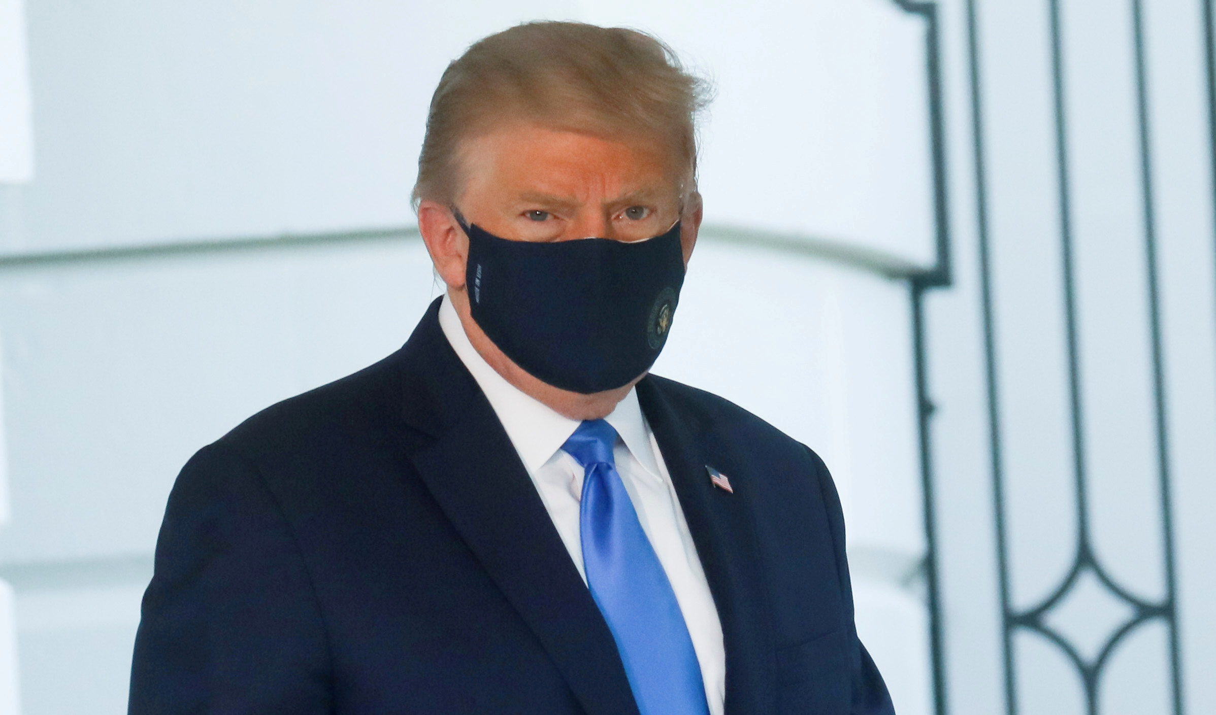 Donald Trump wearing a face mask