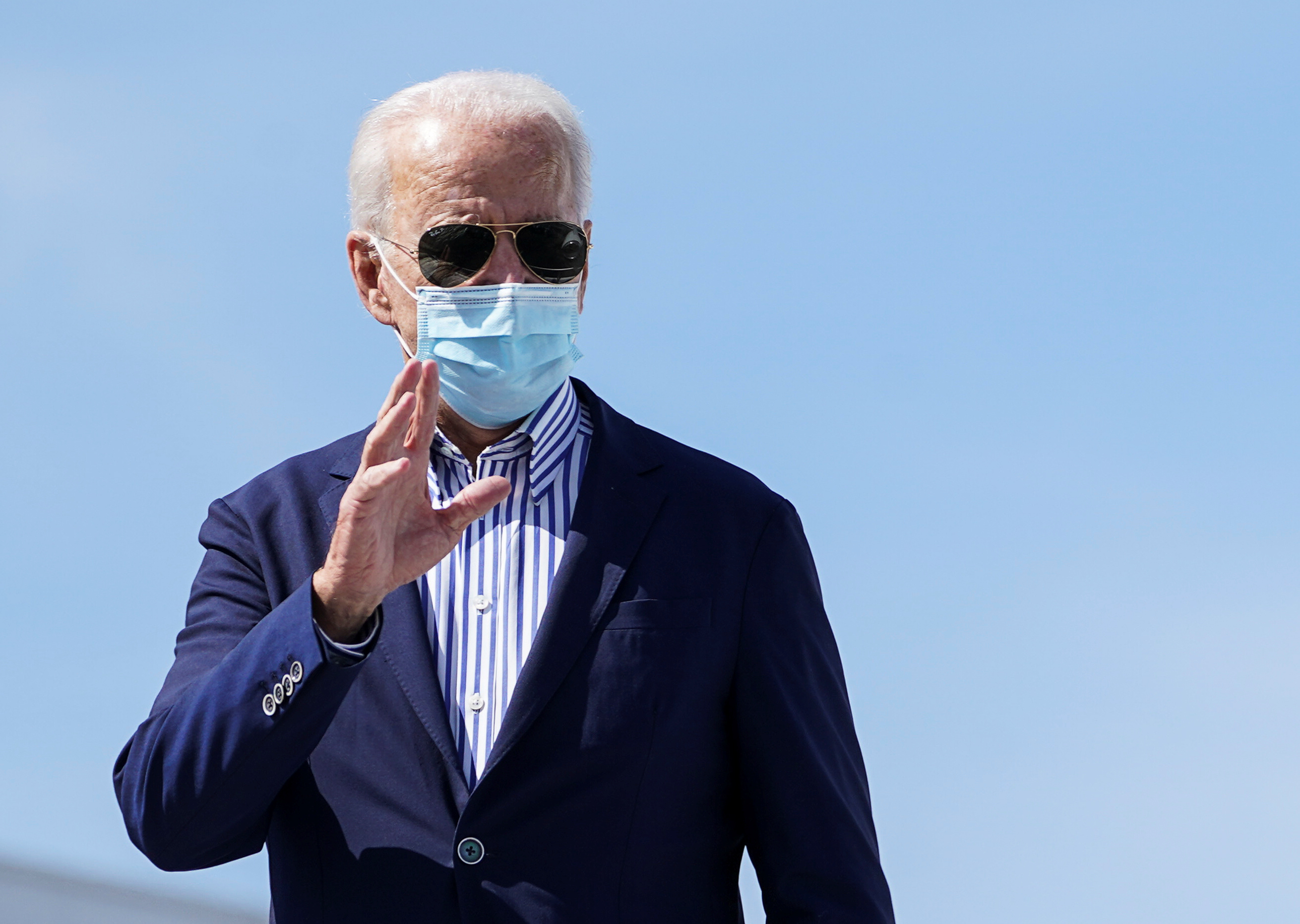 Democratic US presidential nominee Joe Biden disembarks from his campaign plane as he arrives at Phoenix Sky Harbor International Airport in Phoenix, Arizona, US, October 8, 2020 [Kevin Lamarque/Reuters]
