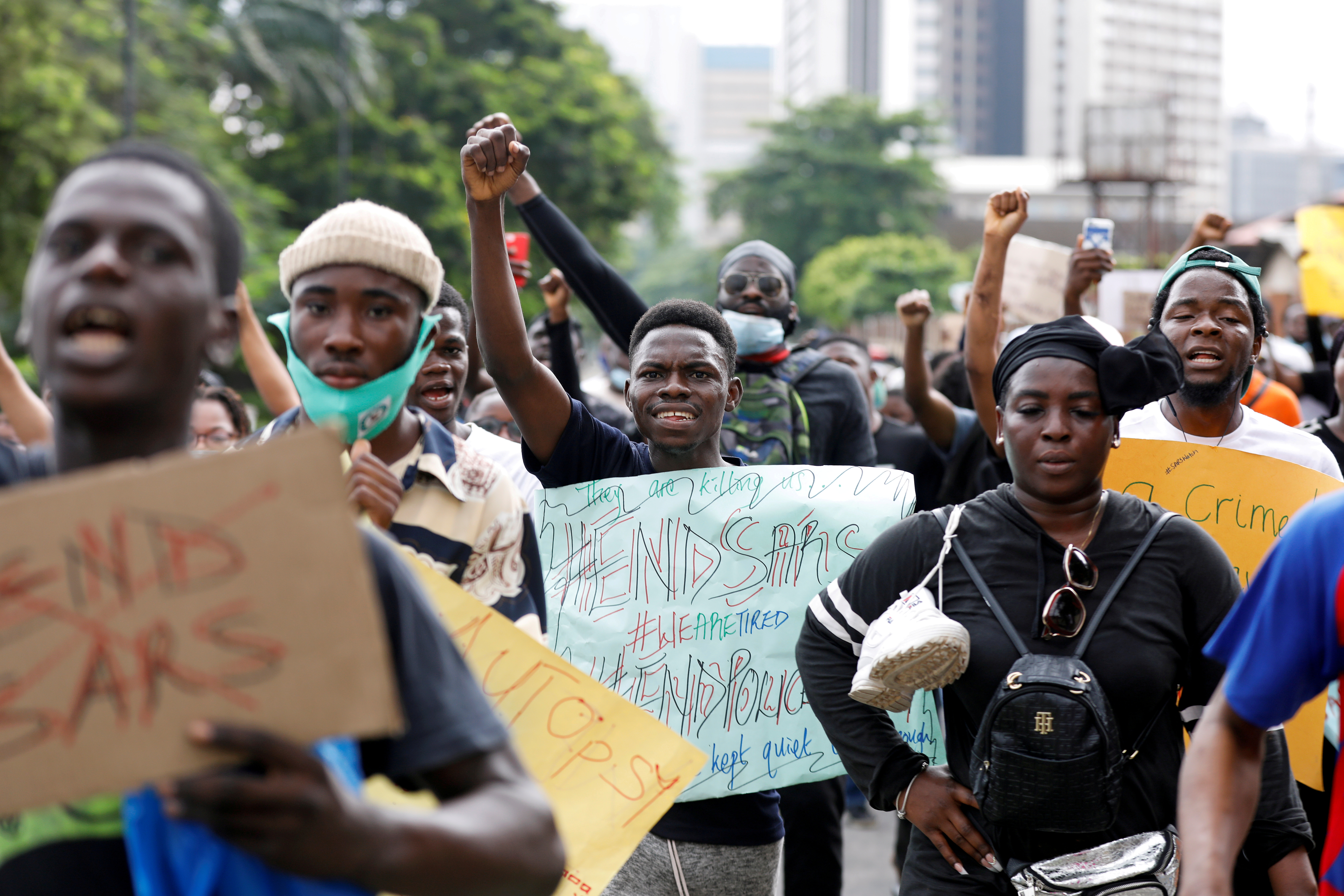Nigerians take part in a protest against violence, extortion and harassment from Nigeria's Special Anti-Robbery Squad (SARS), in Lagos on October 11, 2020 [Reuters/Temilade Adelaja]