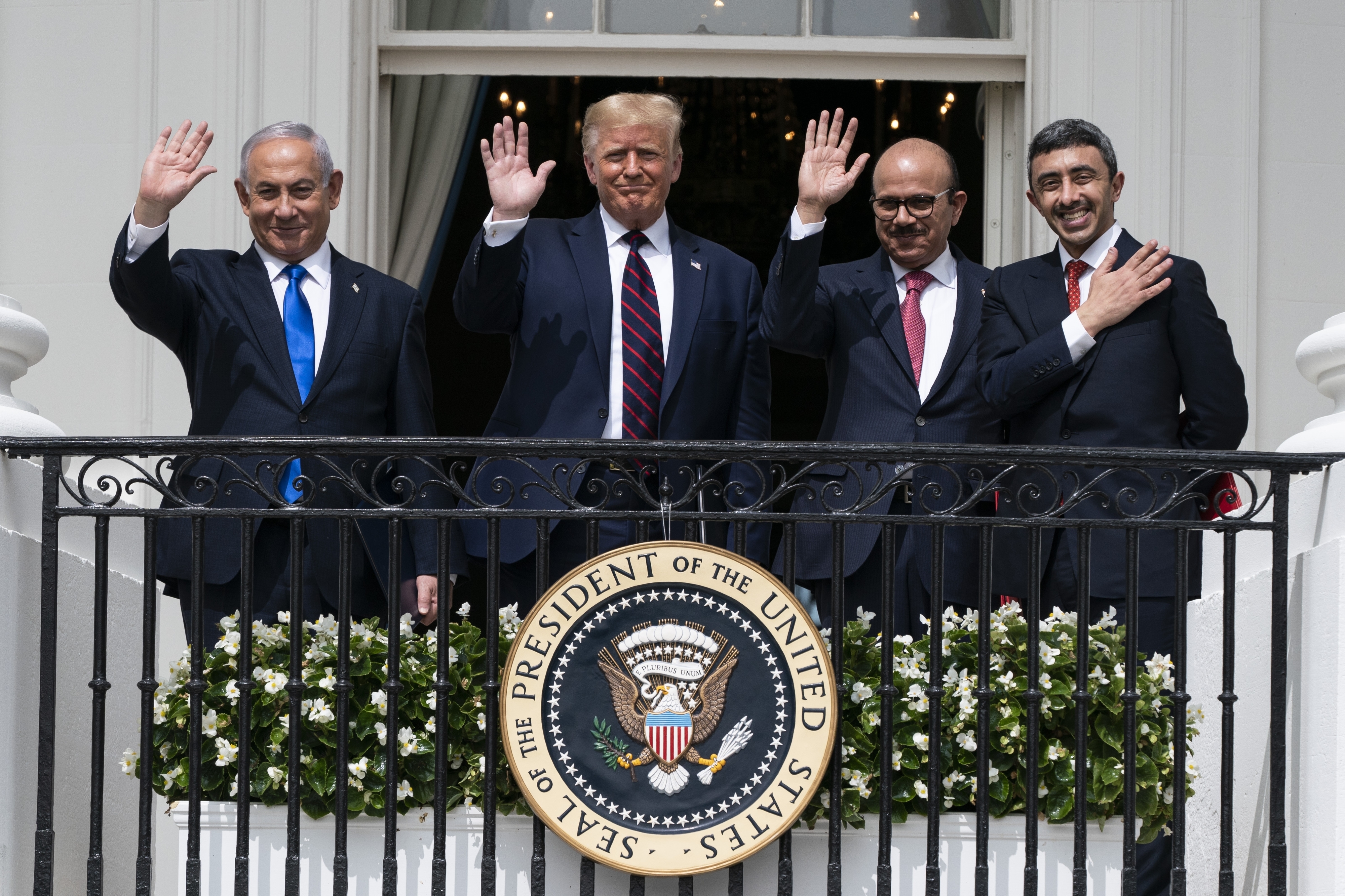 Israeli Prime Minister Benjamin Netanyahu, left, U.S. President Donald Trump, Bahrain Foreign Minister Khalid bin Ahmed Al Khalifa and United Arab Emirates Foreign Minister Abdullah bin Zayed al-Nahyan pose