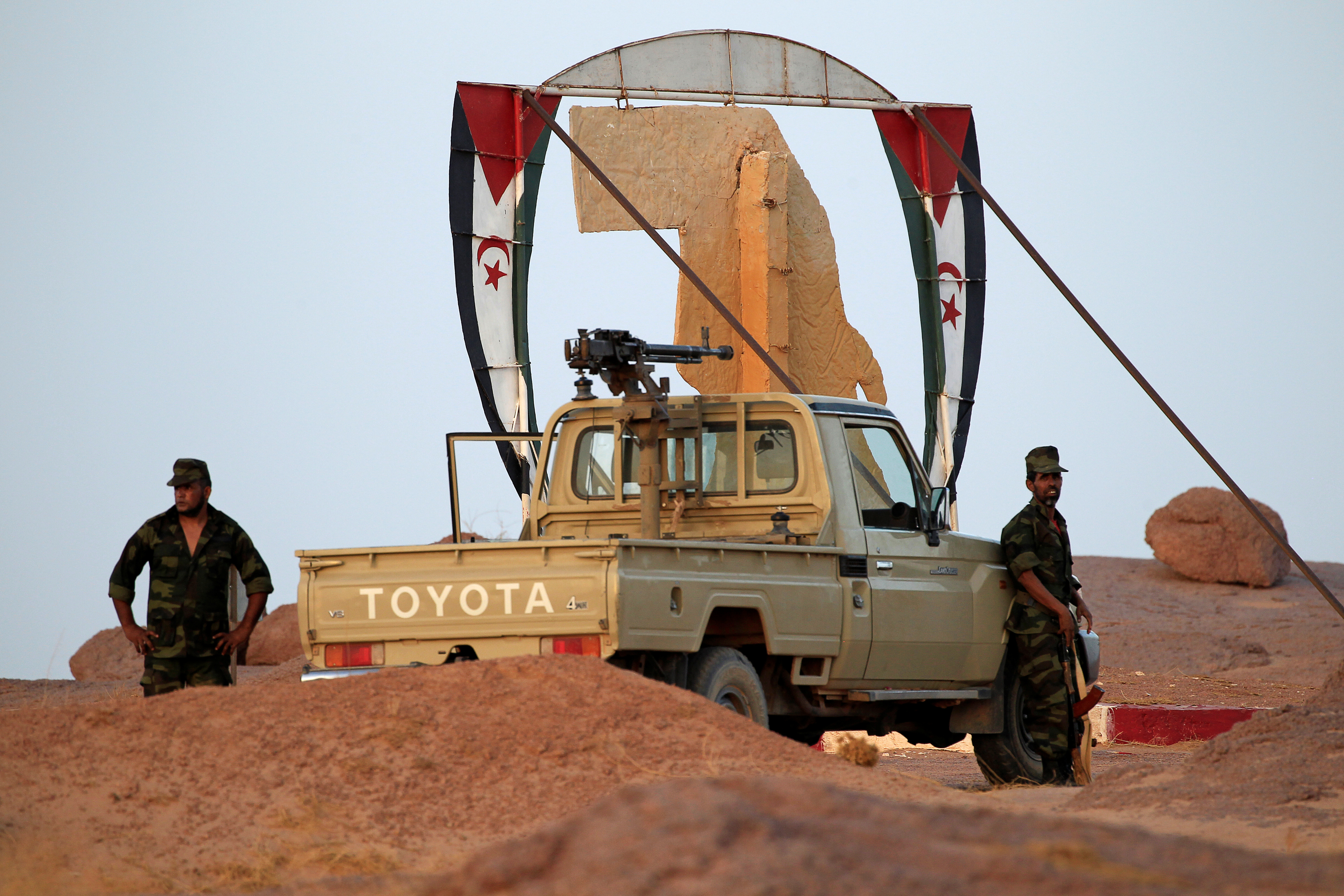 Polisario Front soldiers stand at an entrance of the fifth sector base in Bir Lahlou, Western Sahara, September 9, 2016.