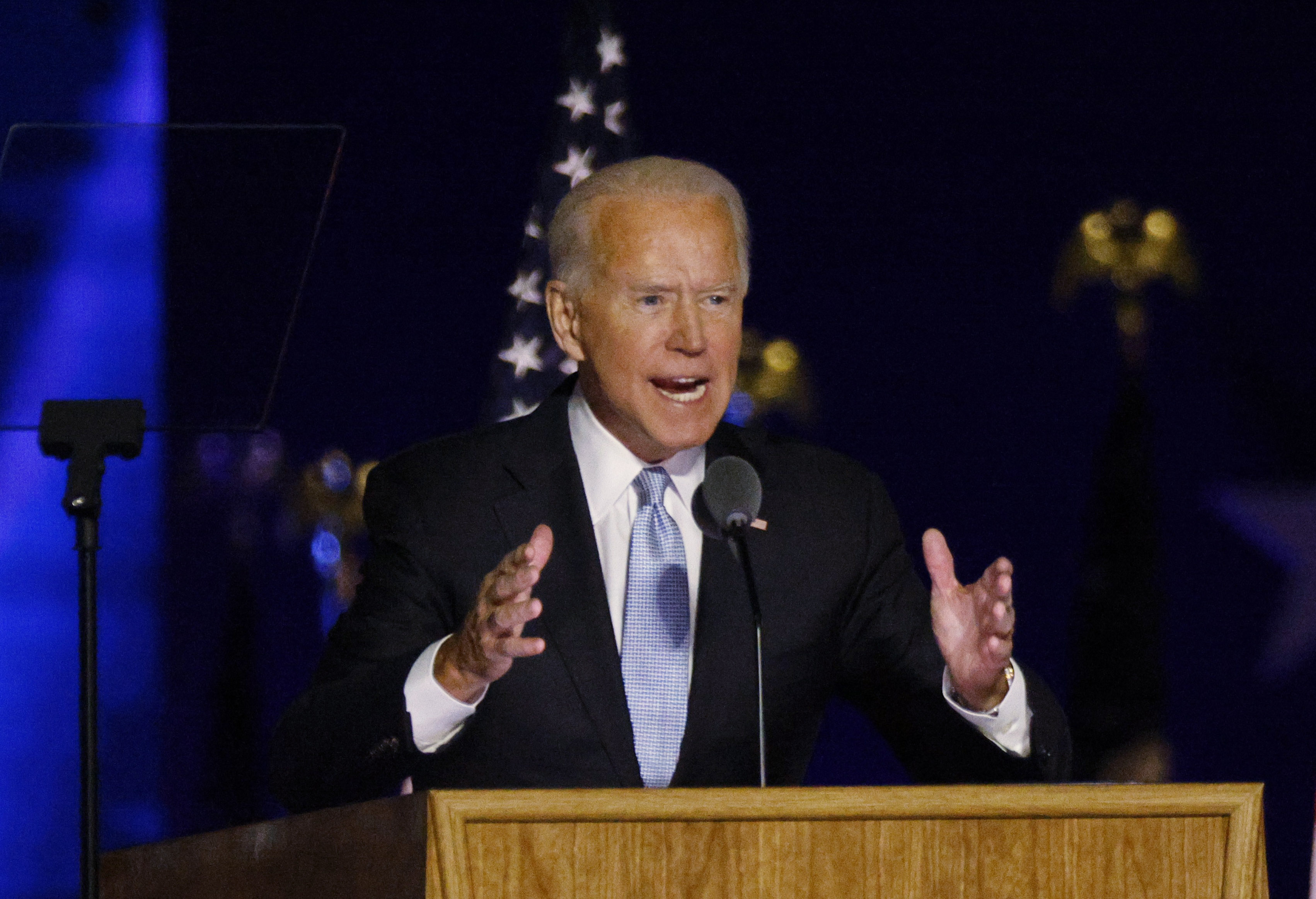 Joe Biden will have to simultaneously address foreign and domestic urgencies [Jim Bourg/Reuters]