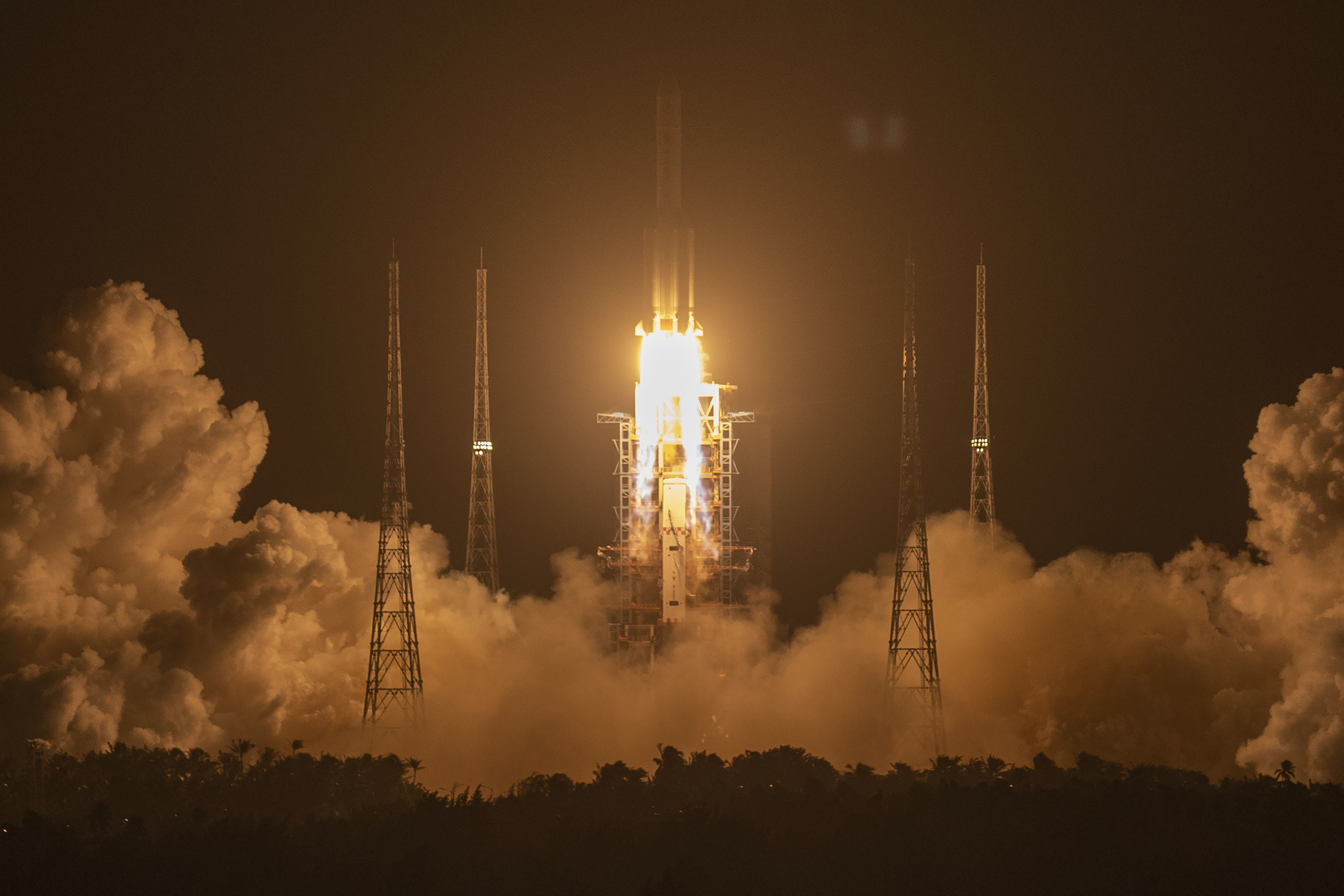 A Long March-5 rocket carrying the Chang’e 5 lunar mission lifts off at the Wenchang Space Launch Center in Wenchang in southern China’s Hainan province
