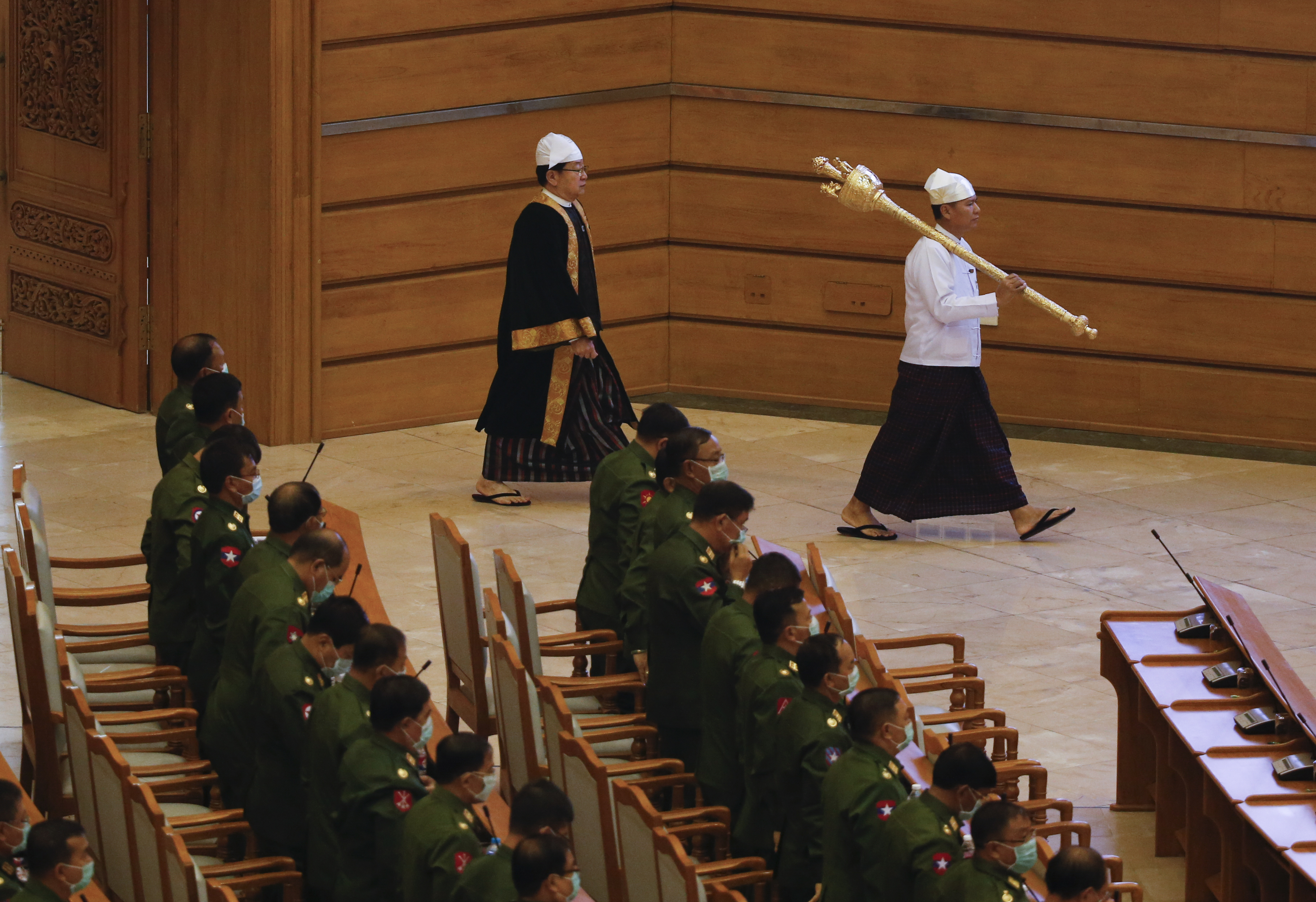 A number of seats in Myanmar’s parliament are reserved for the armed forces, which has made it difficult for the government to move forward on reforms to reduce the military’s role in politics [File: Lynn Bo Bo/EPA)
