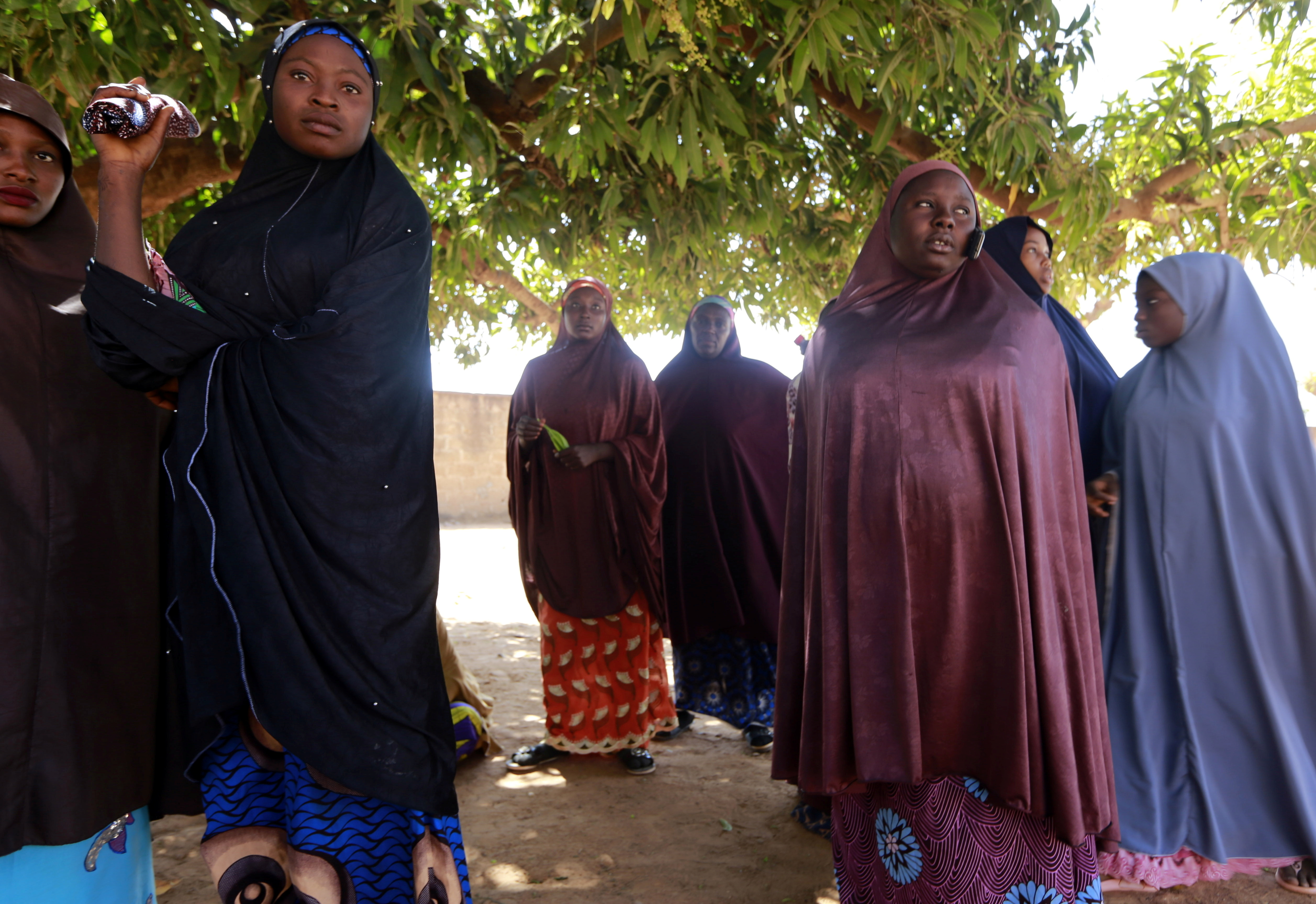 Parents gather at the Government Science school after gunmen abducted students from it, in Kankara, in northwestern Katsina state, Nigeria