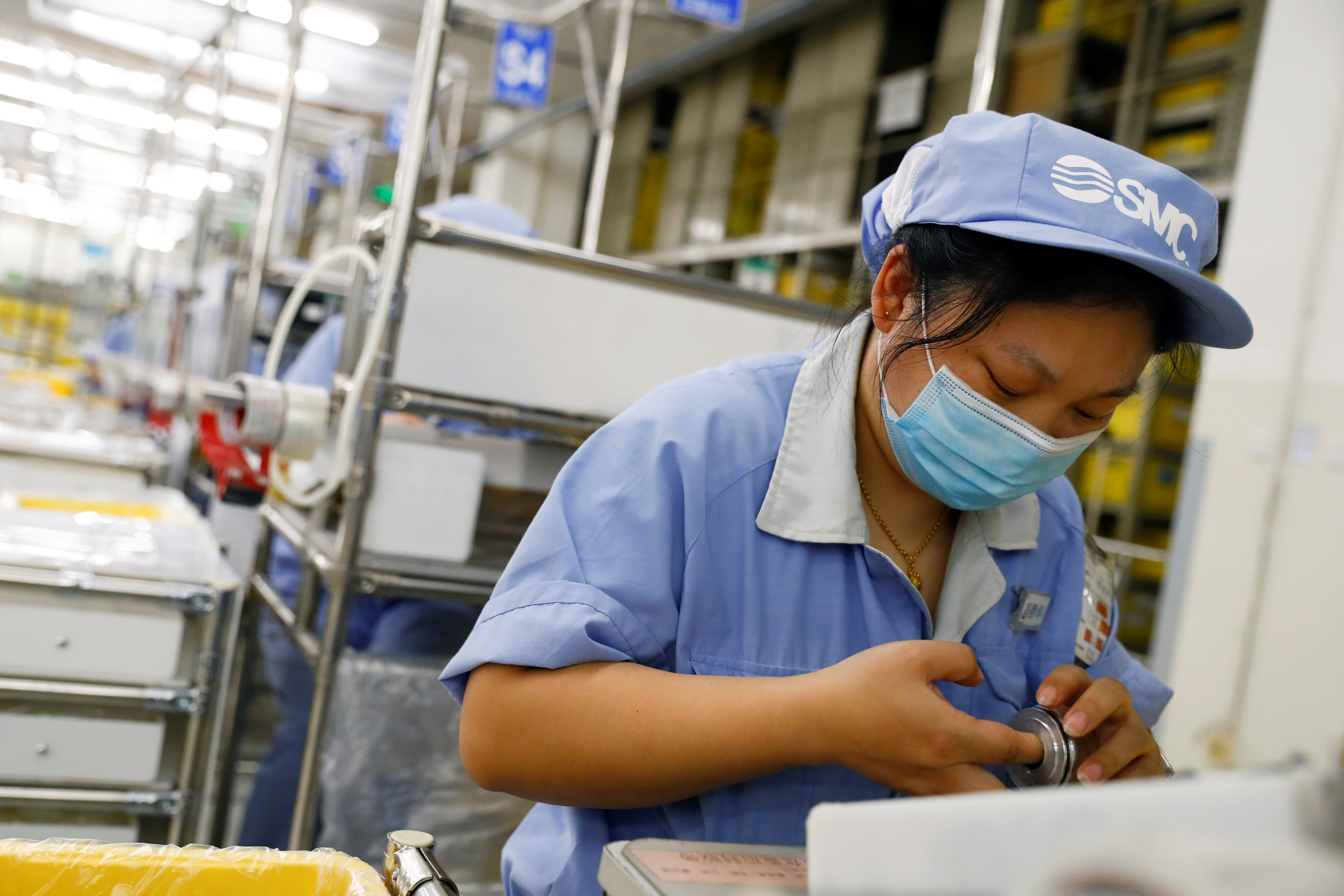 A female worker in a factory.