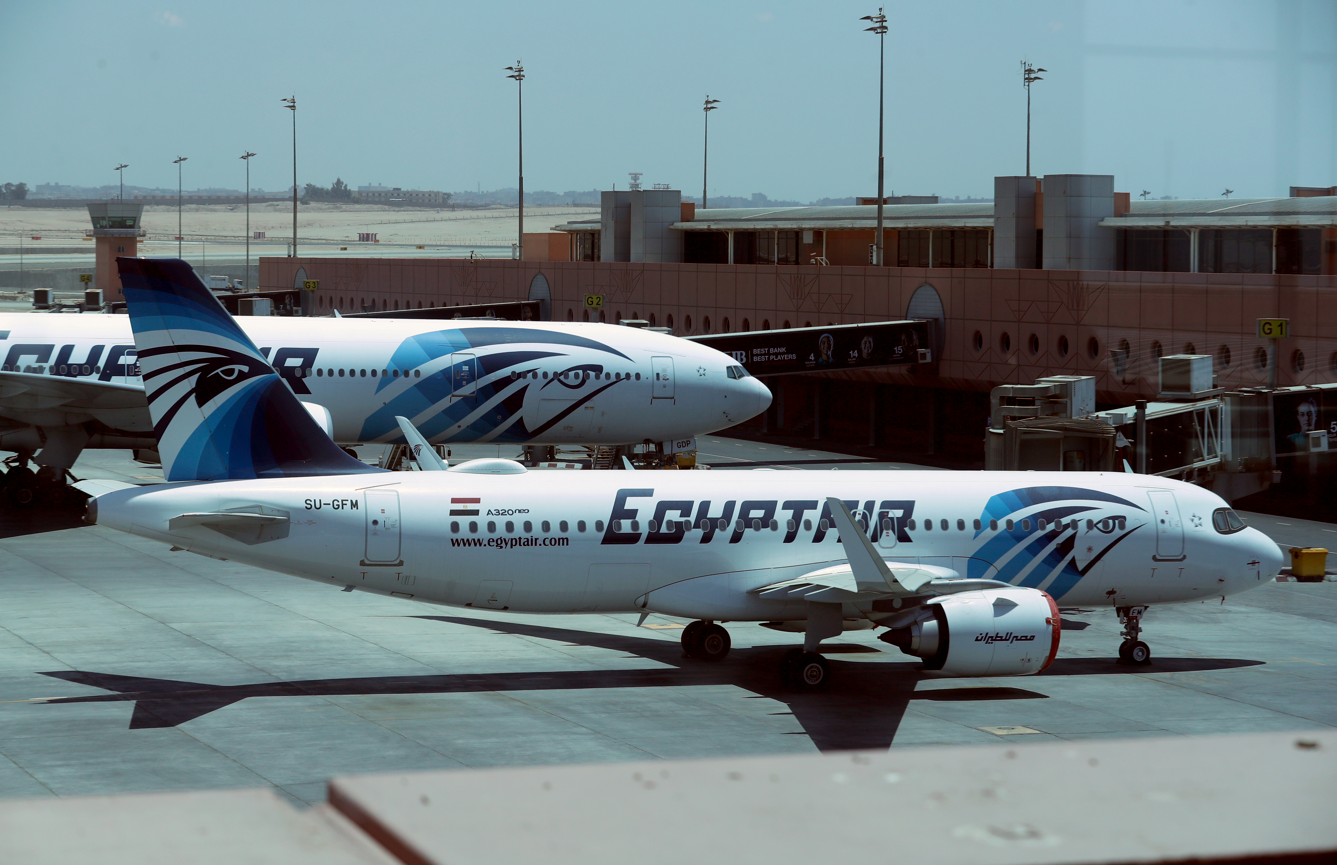 EgyptAir planes are seen on the tarmac, following an outbreak of the coronavirus disease (COVID-19), at Cairo International Airport in Cairo, Egypt, June 18, 2020. REUTERS/Mohamed Abd El Ghany