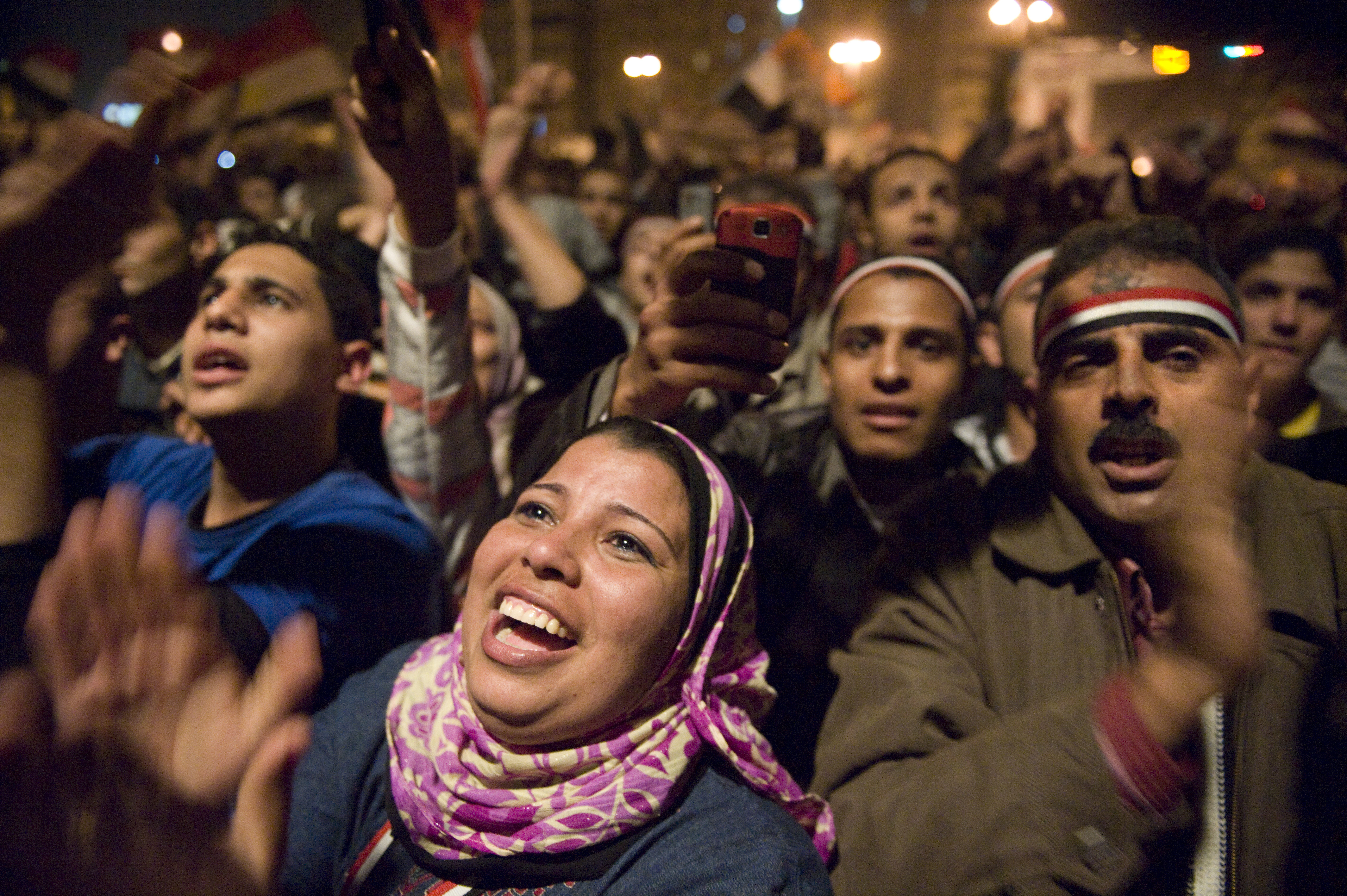 Protesters in Tahrir Square celebrate after hearing that President Hosni Mubarak had stepped down as president in Cairo, Egypt, on February 11, 2011 [Linda Davidson/The Washington Post via Getty Images]