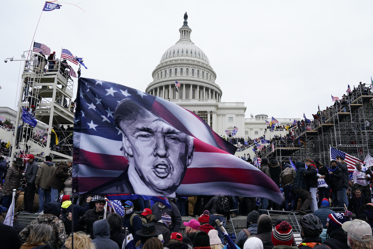 Pro-Trump protesters storm the grounds of the US Capitol, in Washington, DC on January 6, 2021. 
