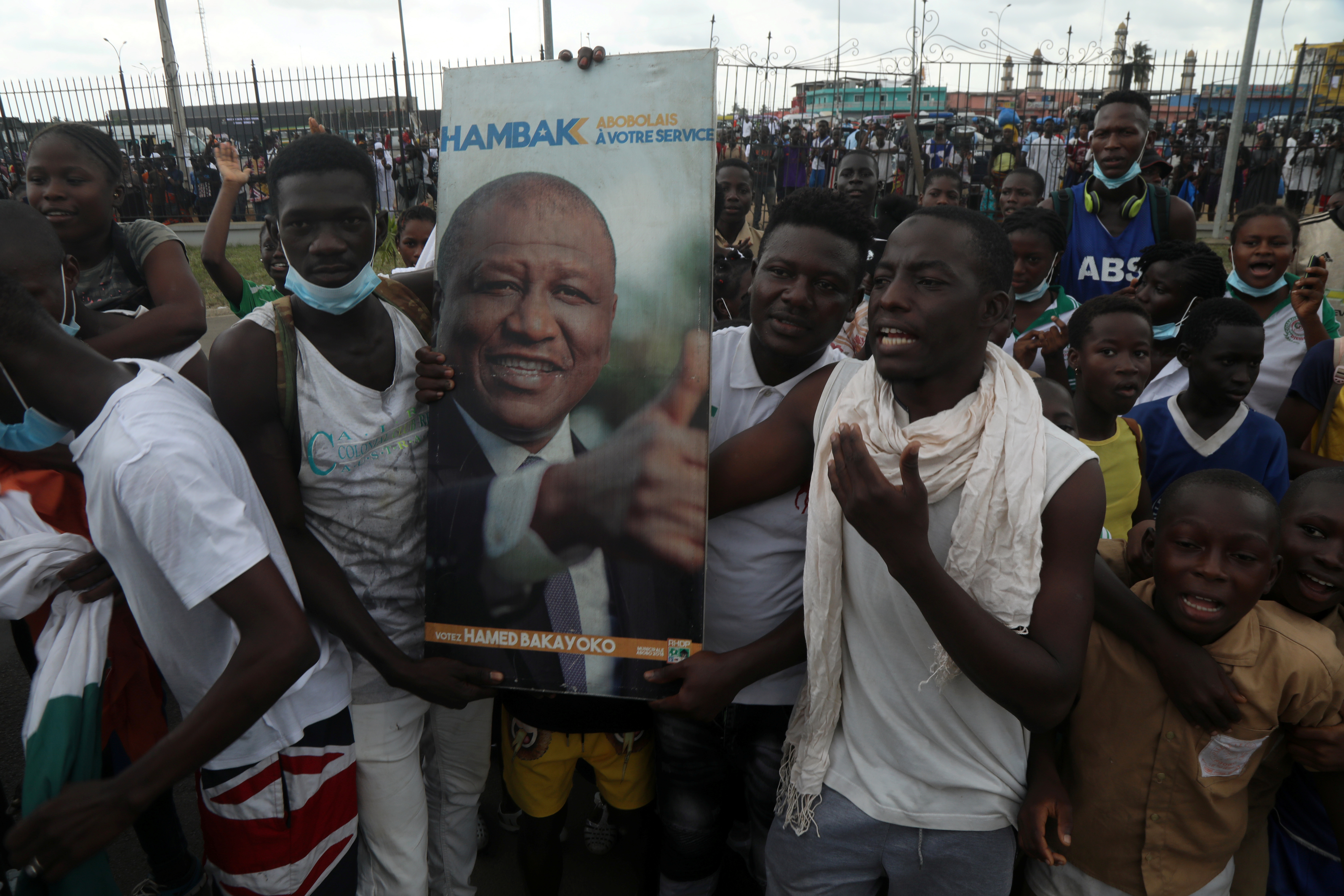 People gather at the town hall of Abobo in honour of Hamed Bakayoko [Luc Gnago/Reuters]