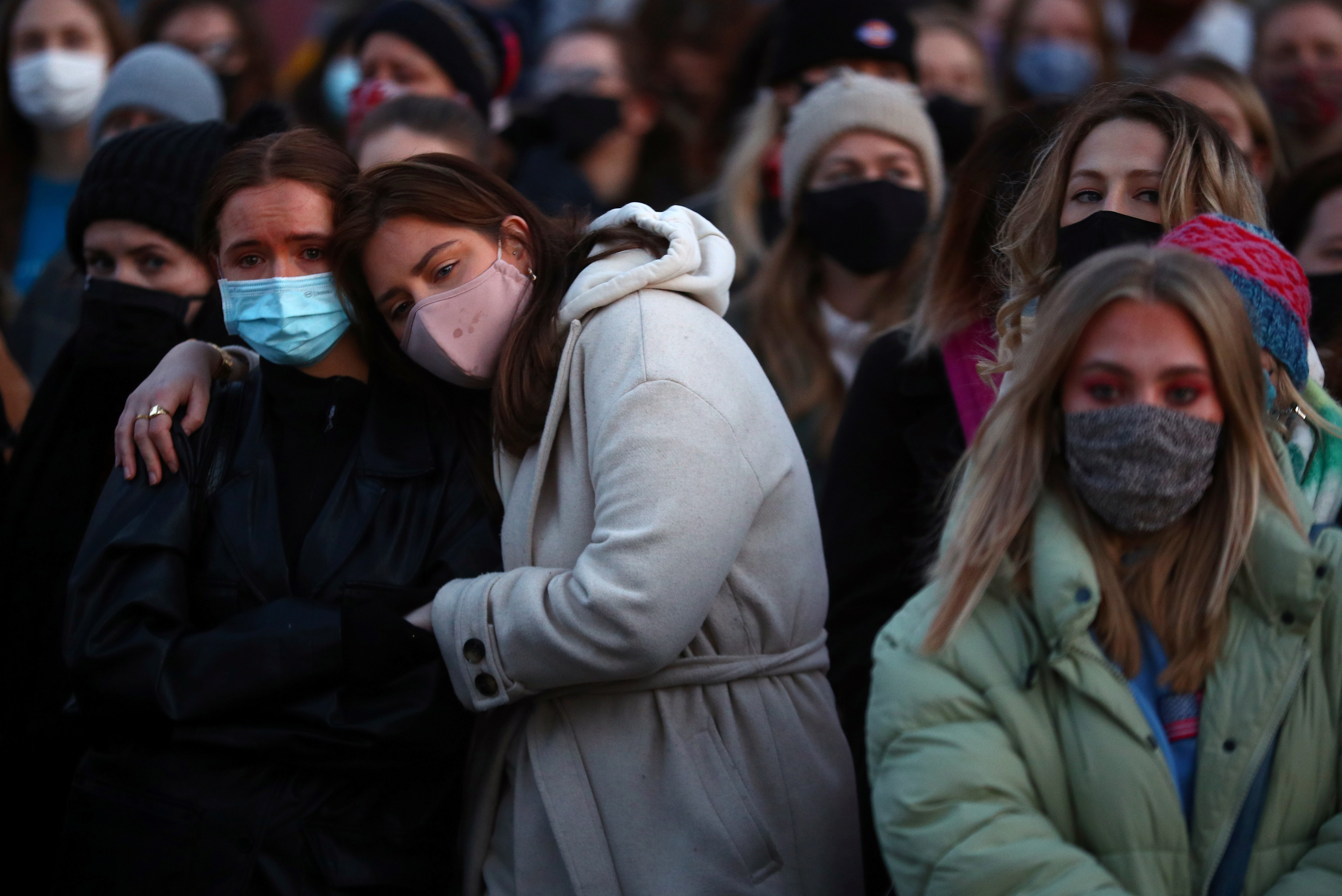 People gather at a memorial site in Clapham Common Bandstand, following the kidnap and murder of Sarah Everard, in London, UK