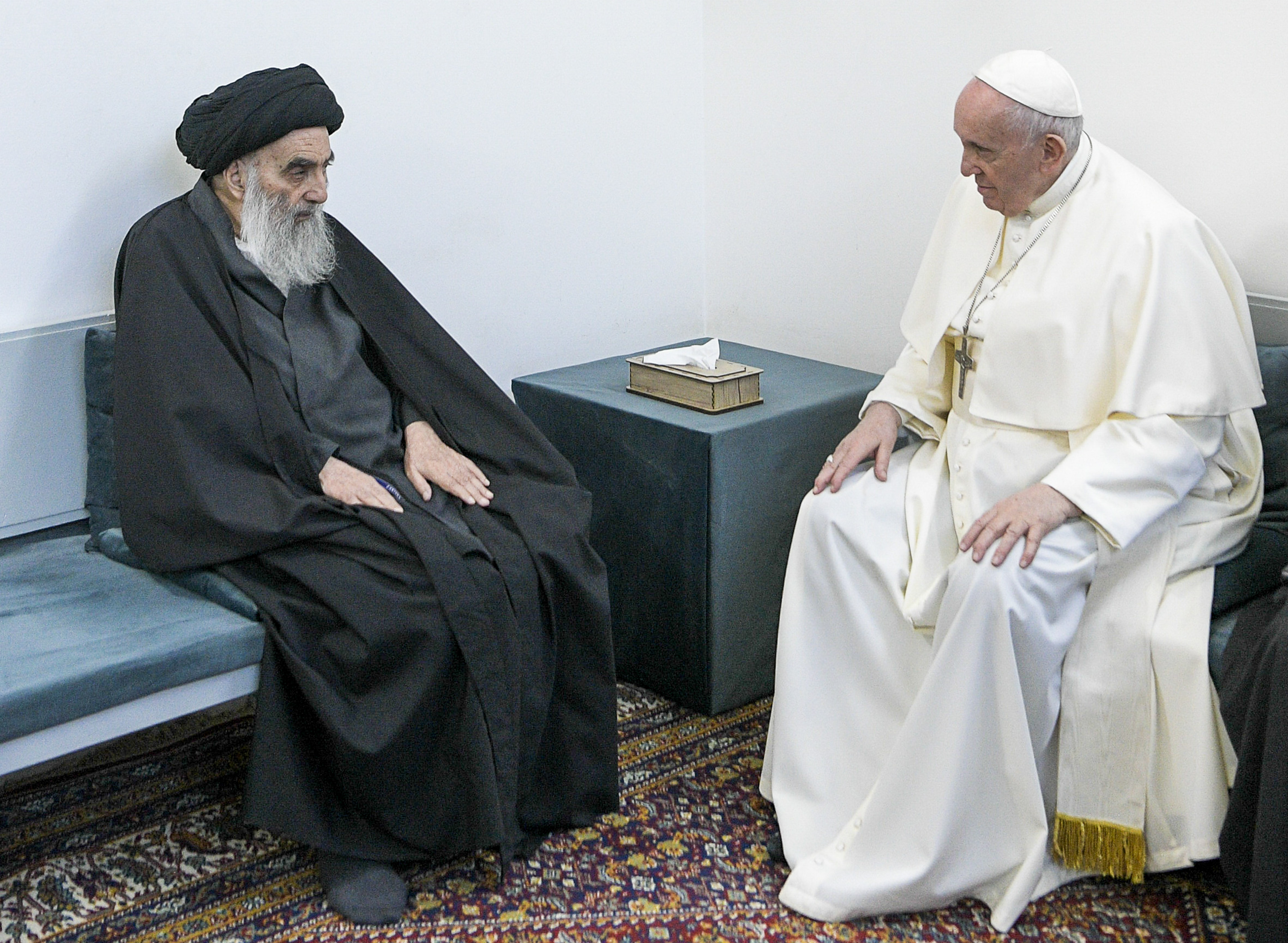 Pope Francis, right, meets with Iraq’s Shia leader, Grand Ayatollah Ali al-Sistani, in Najaf, Iraq, on March 6, 2021 [Vatican Media via AP]