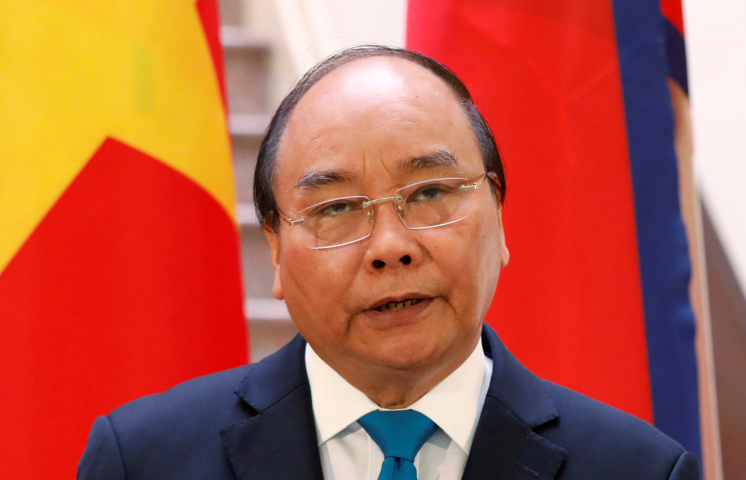 Vietnam's Prime Minister Nguyen Xuan Phuc attends a news conference with Nepal's Prime Minister Khadga Prasad Sharma Oli (not pictured) at the Government Office in Hanoi, Vietnam May 11, 2019