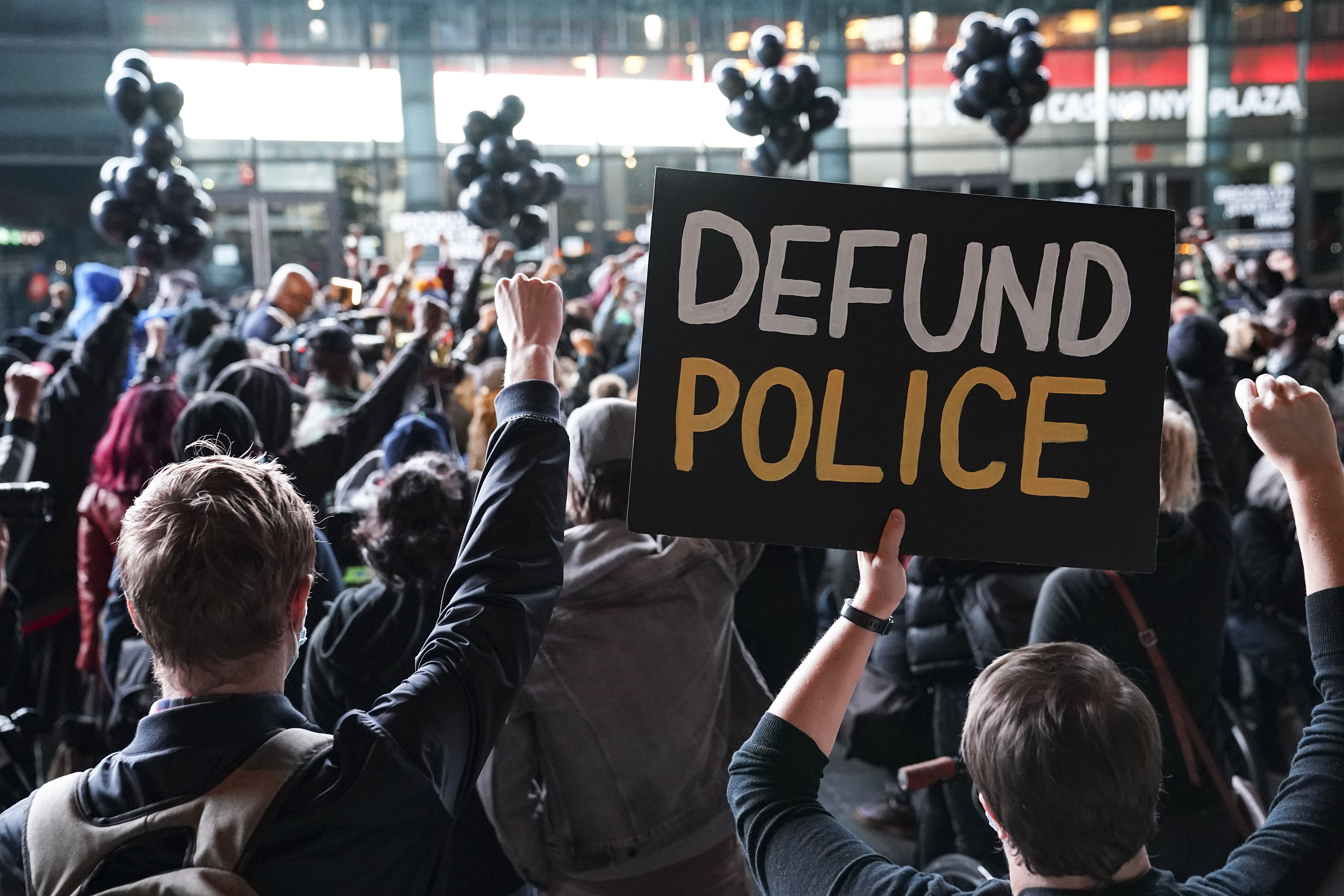 While calls to "defund" police departments persist, Democratic leaders are distancing themselves from those demands [File: John Minchillo/AP Photo]