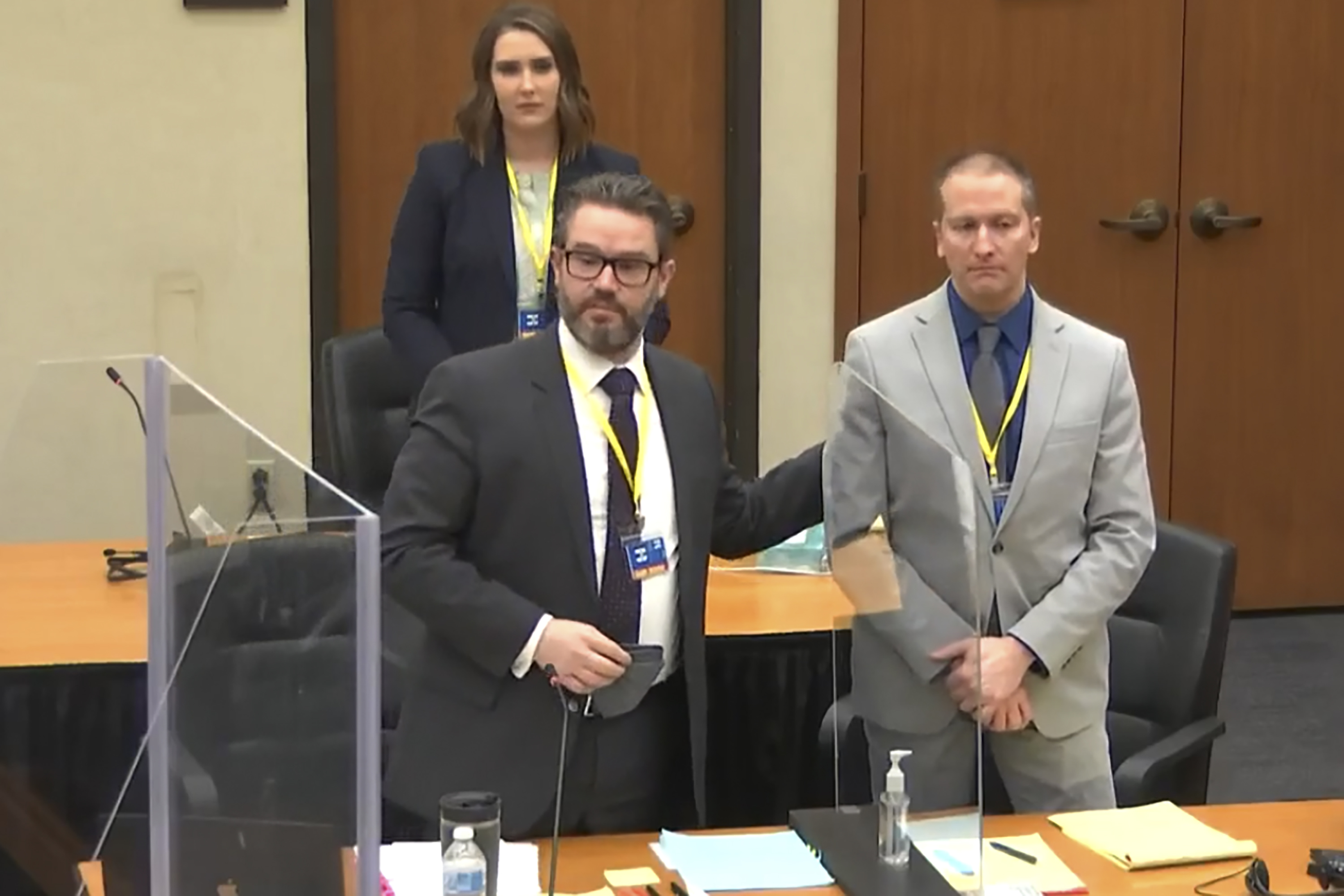 Legal experts suggest lawyer Eric Nelson, left, has his work cut out for him as he presents his defence of former Minneapolis police officer Derek Chauvin, right [File: Court TV, via AP, Pool]